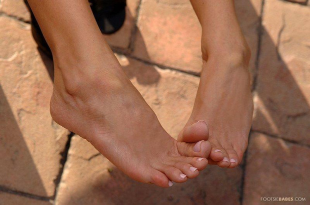 Girls show feet play footsie